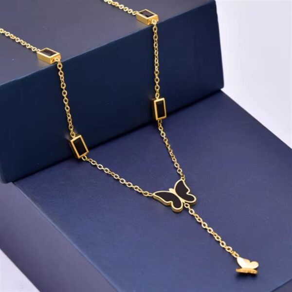 Gold And Black Butterfly Necklace - Image 3