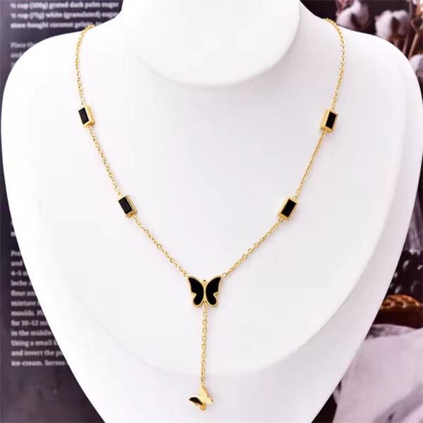 Gold And Black Butterfly Necklace - Image 4