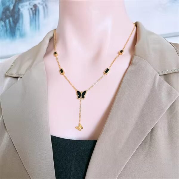 Gold And Black Butterfly Necklace - Image 5