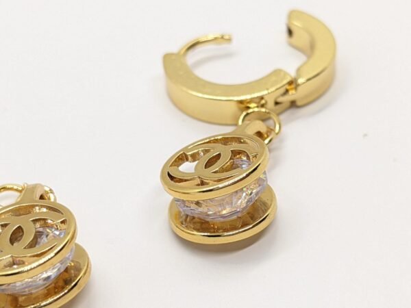 Glamour Twist Gold Zircon Earrings - Image 3